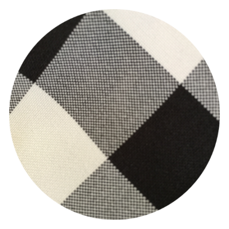 A black and white checkered pattern on a round surface.