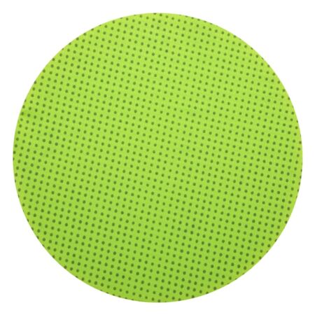 A round green mat with a pattern of small squares.