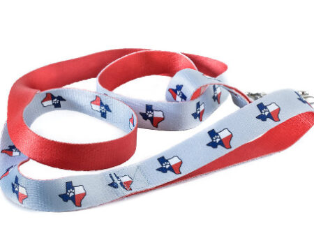 A red and blue dog leash with texas flag design.