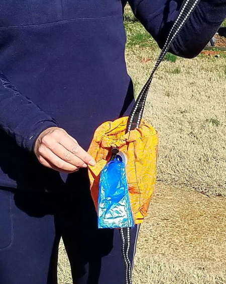 A person holding onto a kite string