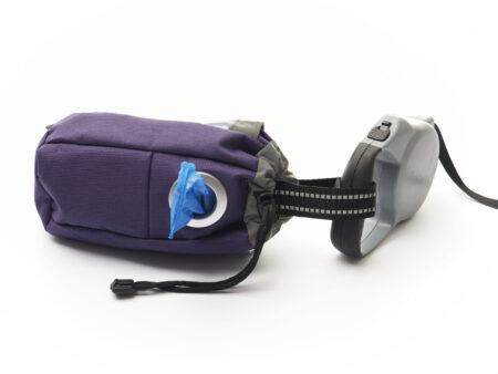 A purple bag with a blue and black handle.