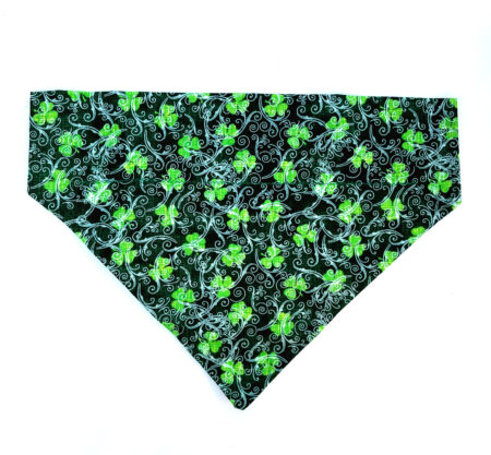 A green and black bandana with shamrocks on it.