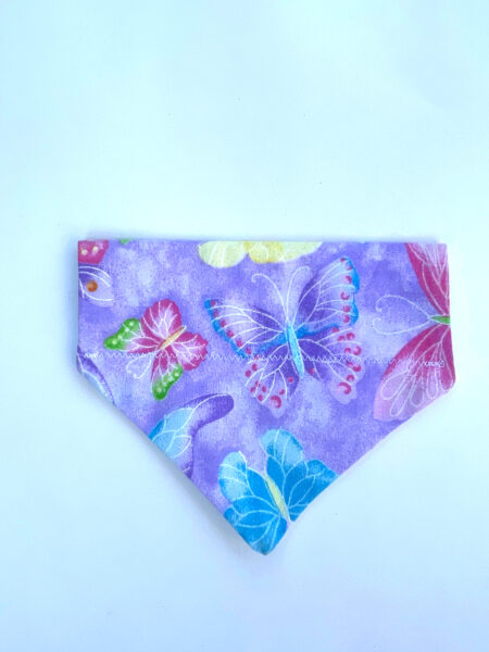 A purple bandana with butterflies on it.