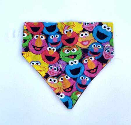 A colorful bandana with sesame street characters.