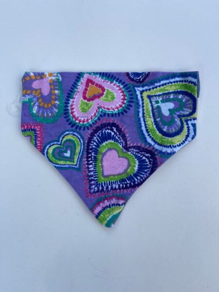 A purple bandana with hearts on it.