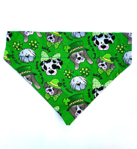 A green bandana with different pictures of dogs.